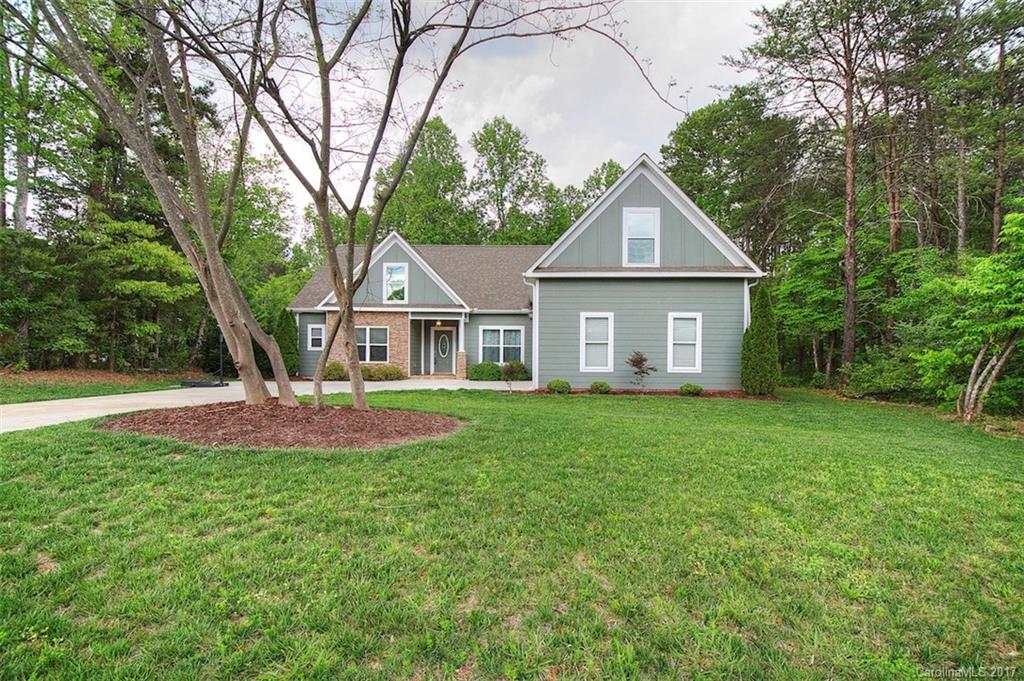 8685 Unity Church Road Denver, NC 28037 - Photo 1 of 24 a front view of house with yard and green space