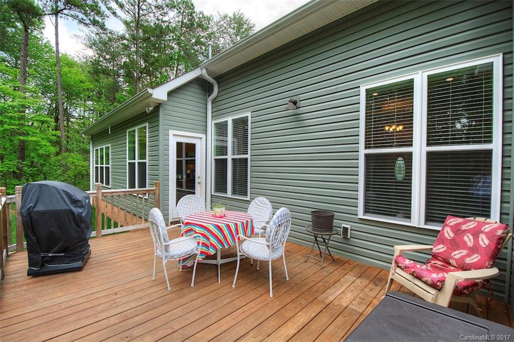 8685 Unity Church Road Denver, NC 28037 - Photo 5 of 24 a balcony with wooden floor and furniture