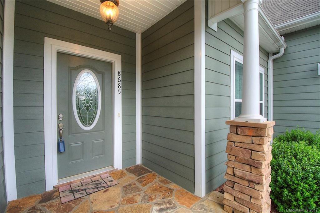 8685 Unity Church Road Denver, NC 28037 - Photo 6 of 24 a view of a wooden door with a large window