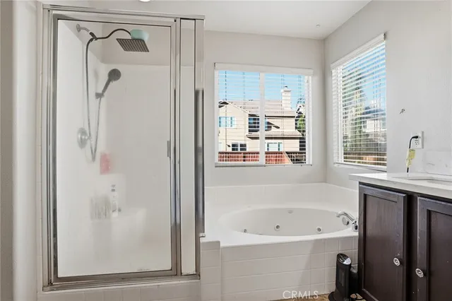 a bathroom with a toilet and a shower curtain