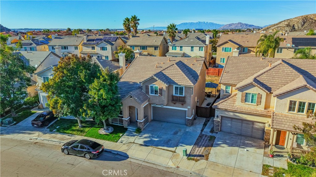 3902 Bluff Street Perris, CA 92571 - Photo 5 of 44 an aerial view of a house with a porch