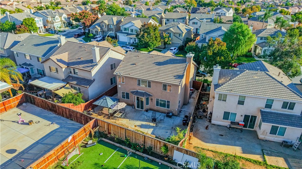 3902 Bluff Street Perris, CA 92571 - Photo 7 of 44 an aerial view of a house with swimming pool
