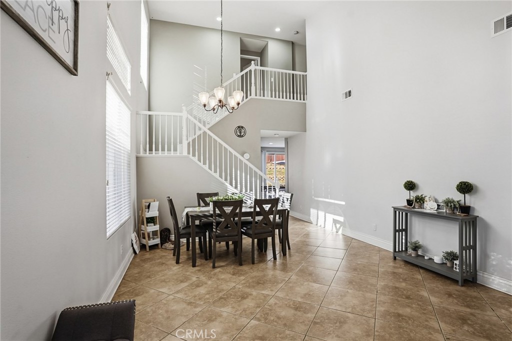 3902 Bluff Street Perris, CA 92571 - Photo 10 of 44 a view of a livingroom with furniture and stairs