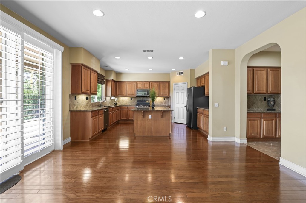 35107 Hogan Drive Beaumont, CA 92223 - Photo 12 of 47 a view of kitchen with wooden floor