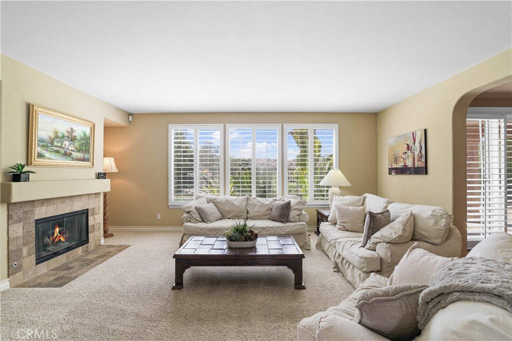 35107 Hogan Drive Beaumont, CA 92223 - Photo 18 of 47 a living room with furniture and a fireplace