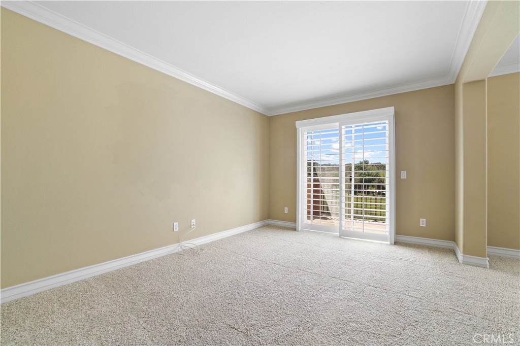 35107 Hogan Drive Beaumont, CA 92223 - Photo 26 of 47 an empty room with windows