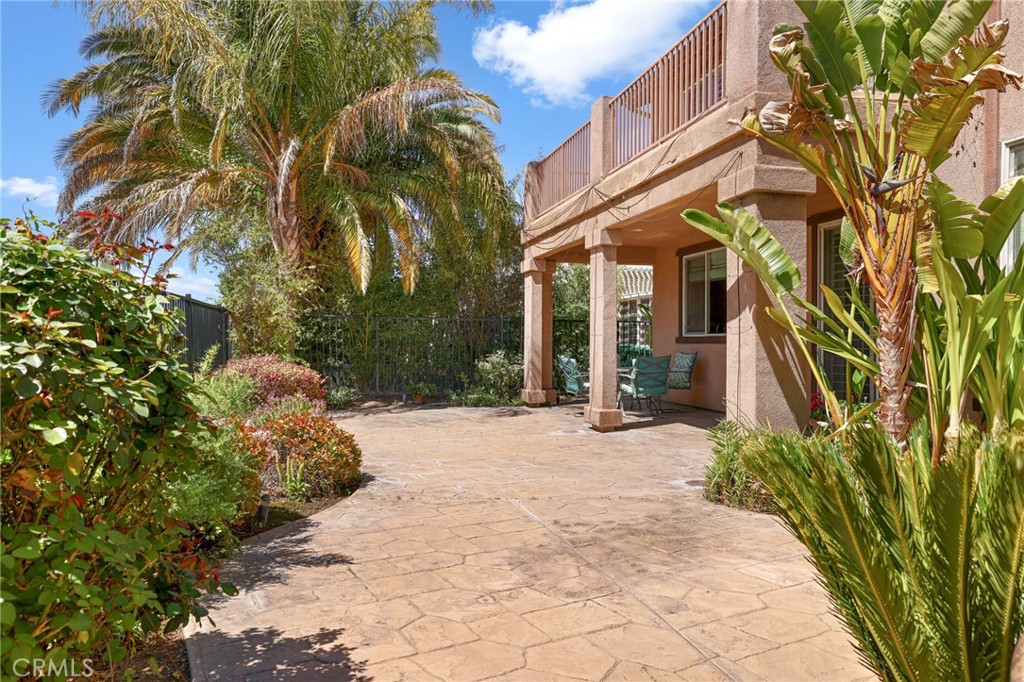 35107 Hogan Drive Beaumont, CA 92223 - Photo 47 of 47 a view of a building with a yard and potted plants