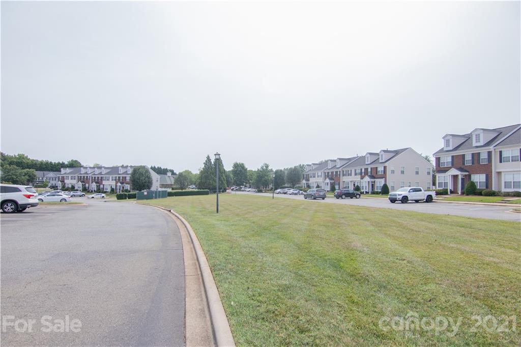 7613 Bluff Point Lane Denver, NC 28037 - Photo 19 of 20 a view of swimming pool and lake view