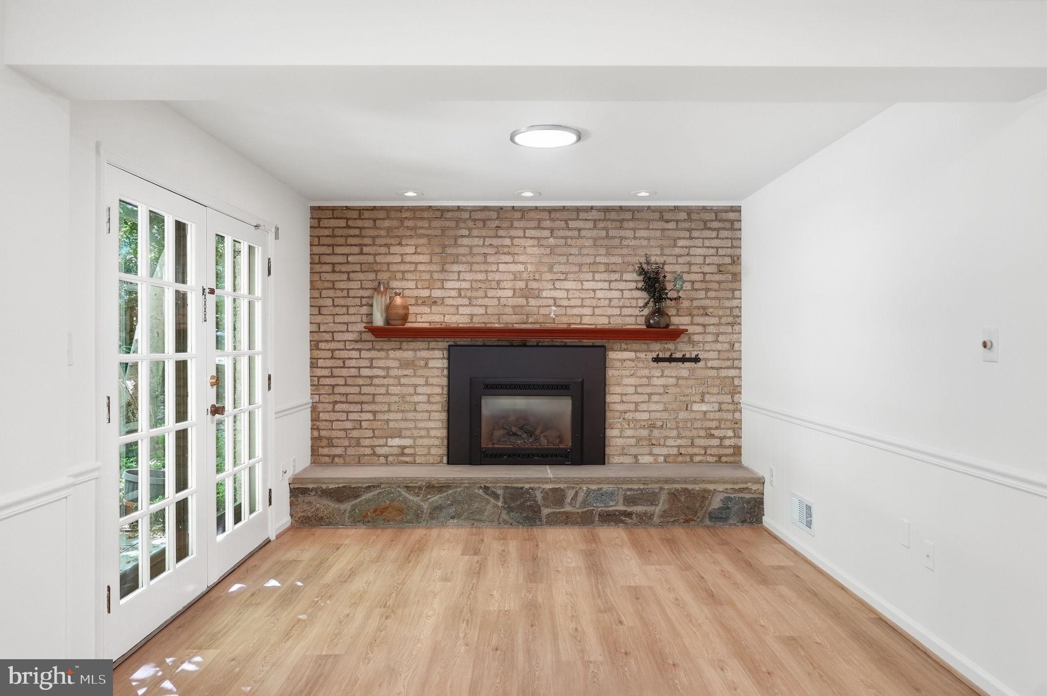 7616 Carteret Road Bethesda, MD 20817 - Photo 13 of 32 Brick Fireplace Surround