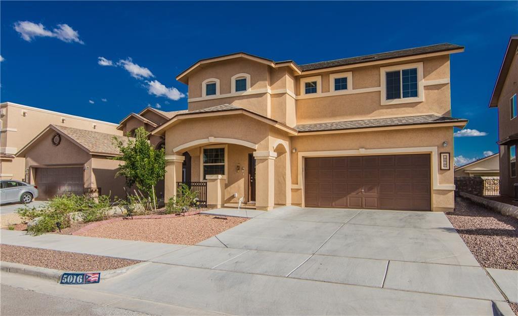 5016 Silver Ranch Avenue El Paso, TX 79934 - Photo 1 of 1 a front view of a house with yard