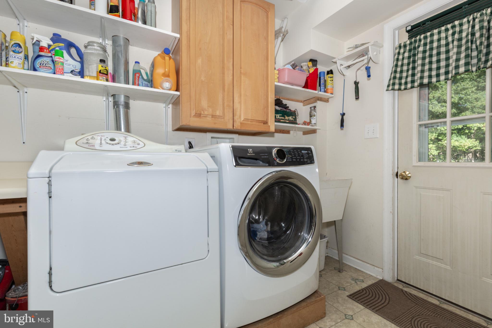 1827 Benedict Road Westminster, MD 21157 - Photo 47 of 86 Main Level Laundry with Walk Out to Deck
