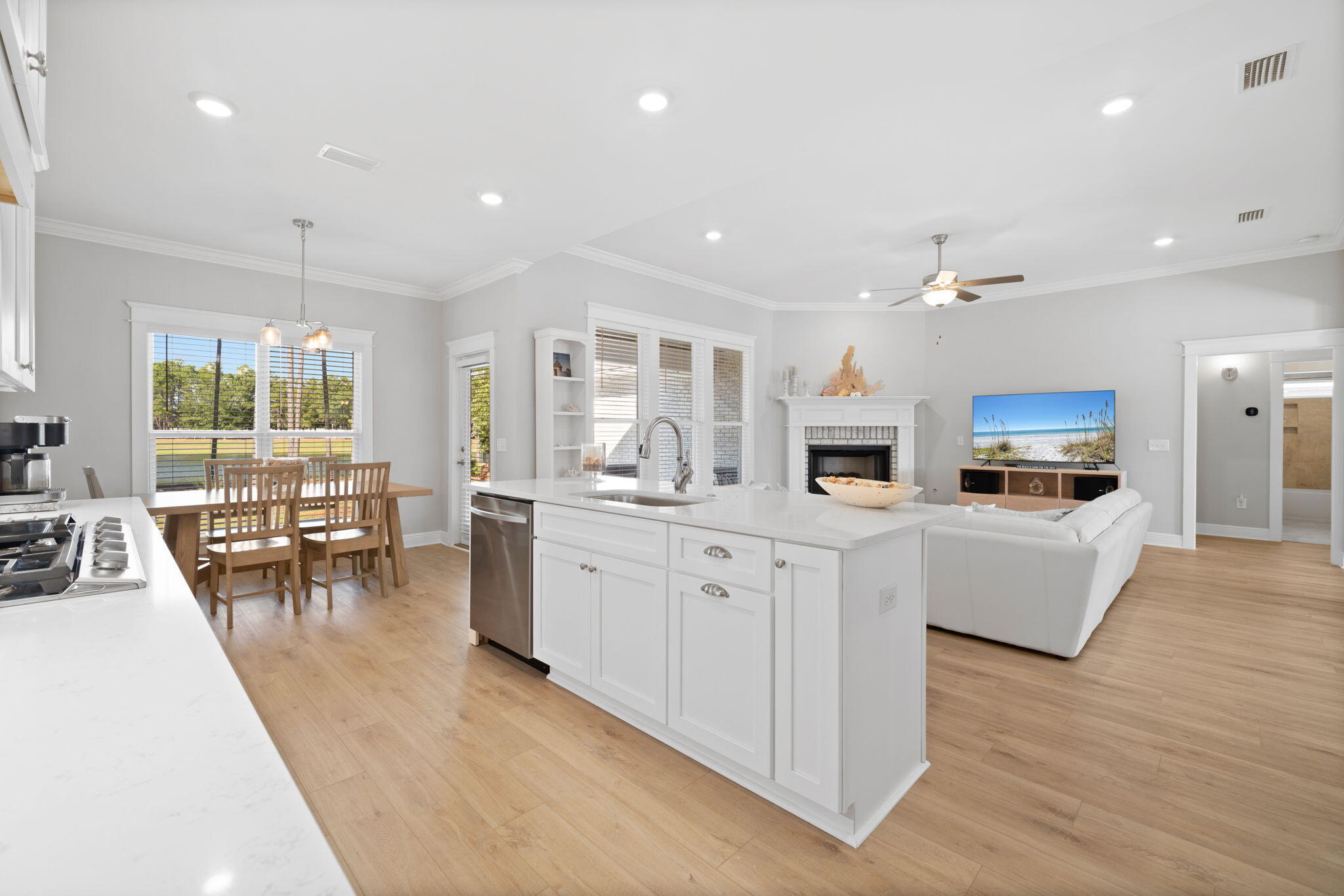 142 Mill Pond Cove Freeport, FL 32439 - Photo 21 of 109 a large white kitchen with lots of counter top space and living room
