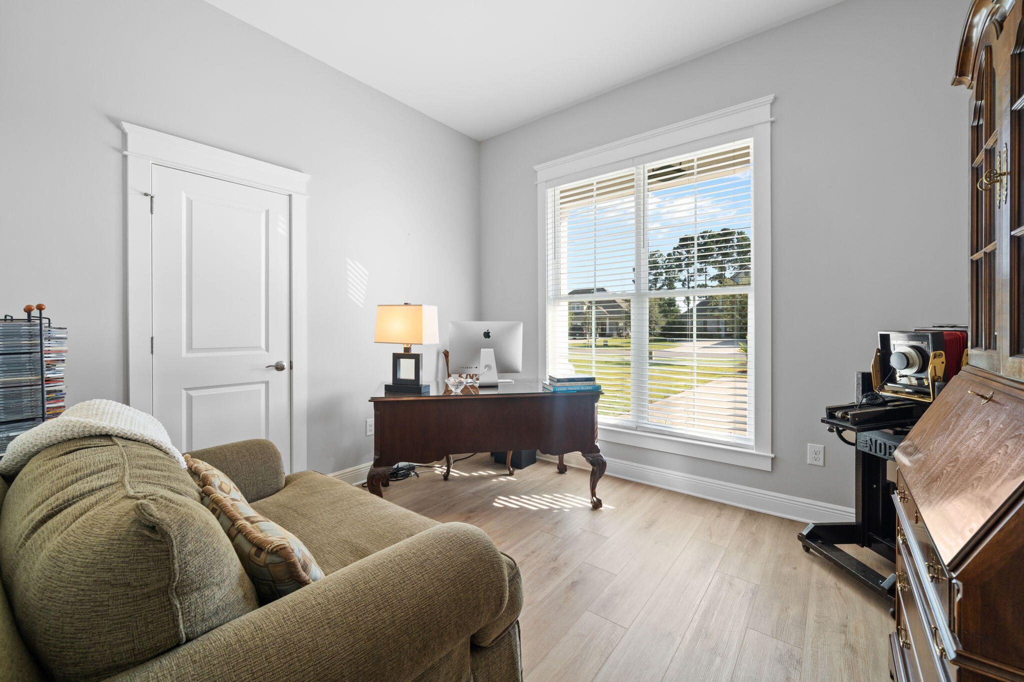 142 Mill Pond Cove Freeport, FL 32439 - Photo 32 of 109 a living room with furniture and a flat screen tv