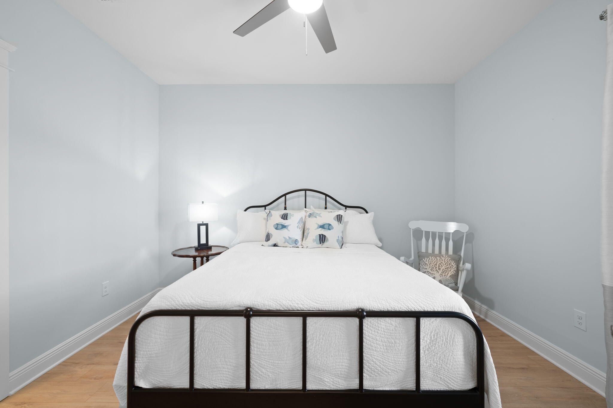 142 Mill Pond Cove Freeport, FL 32439 - Photo 37 of 109 a bedroom with a bed and a chandelier