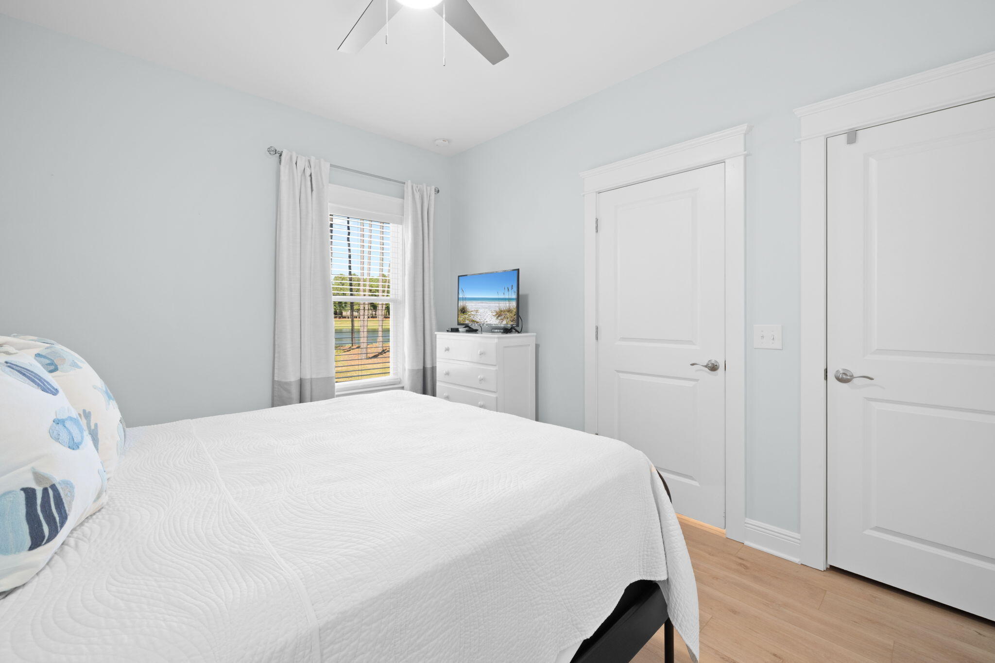 142 Mill Pond Cove Freeport, FL 32439 - Photo 38 of 109 a bedroom with a bed and a window