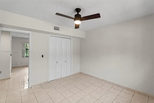 a view of a hallway view with staircase