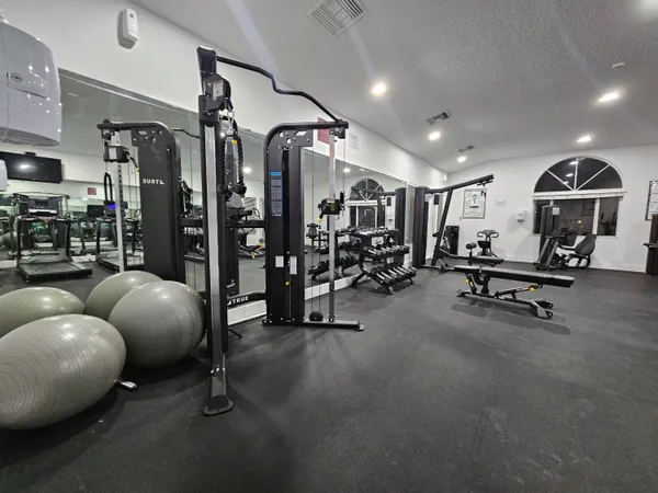 a view of a room with gym equipment