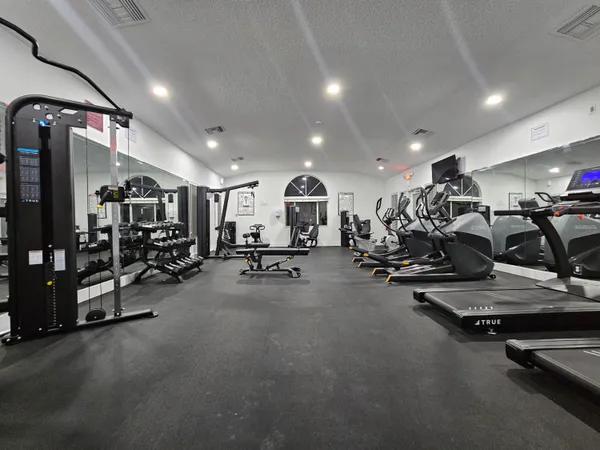 a view of a room with gym equipment