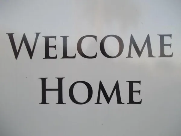 a view of staircase with wooden floor