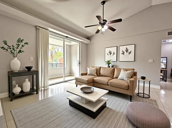 a living room with furniture and a window