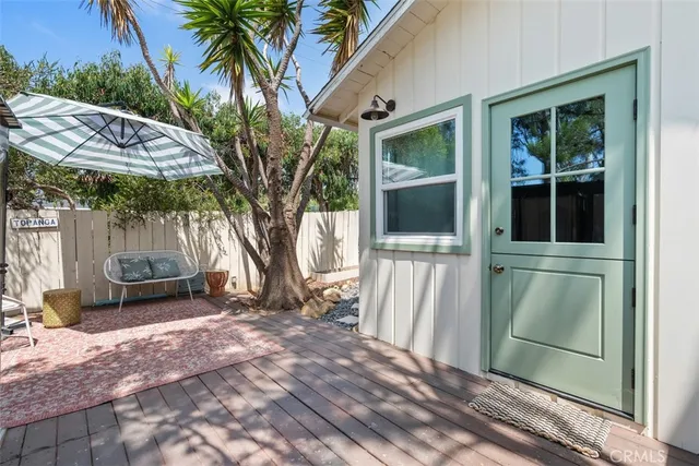 a kitchen with stainless steel appliances granite countertop a sink and a stove