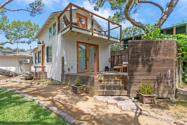 a view of a backyard of the house