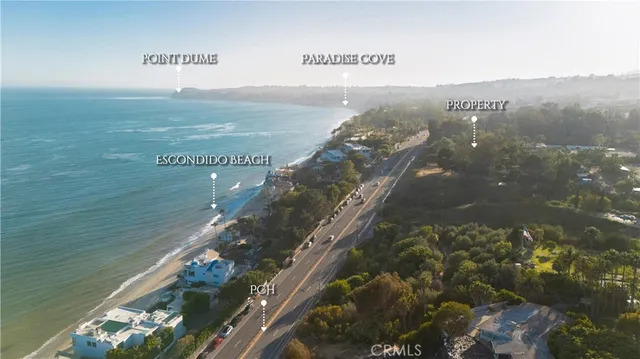 a front view of a house with a garage