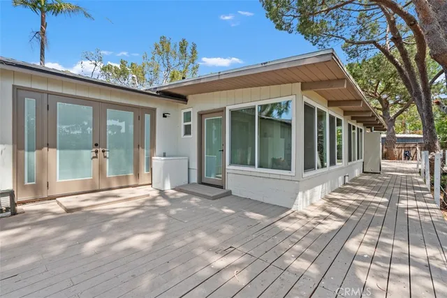a view of an chairs and table in the patio