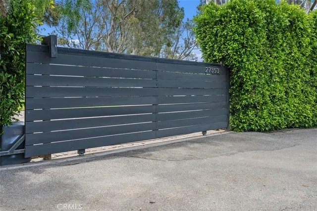 a front view of house with yard and outdoor seating