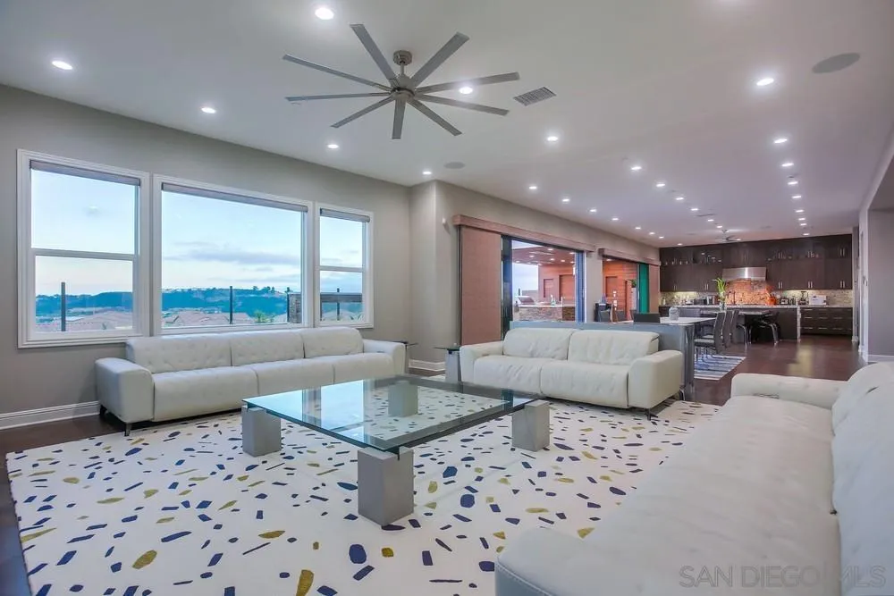 2575 Glasgow Drive Carlsbad, CA 92010 - Photo 19 of 43 a living room with furniture and a large window