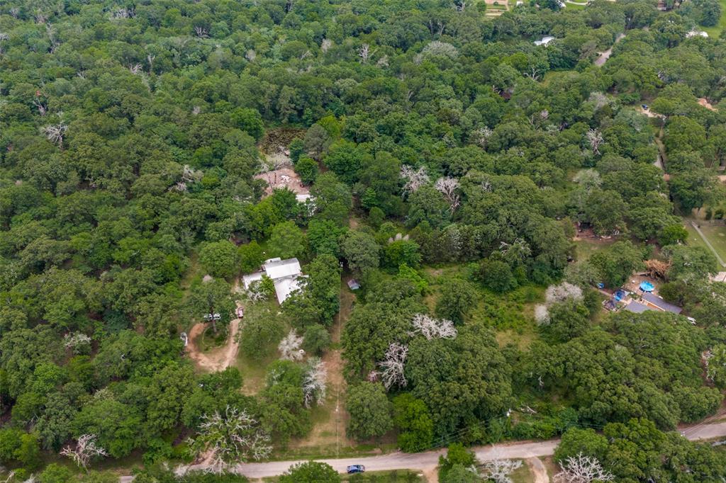 606 Quiram Lane Kemp, TX 75143 - Photo 23 of 23 an aerial view of residential houses with outdoor space and trees