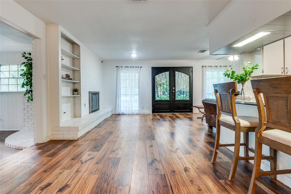 606 Quiram Lane Kemp, TX 75143 - Photo 5 of 23 a view of a livingroom with furniture and wooden floor