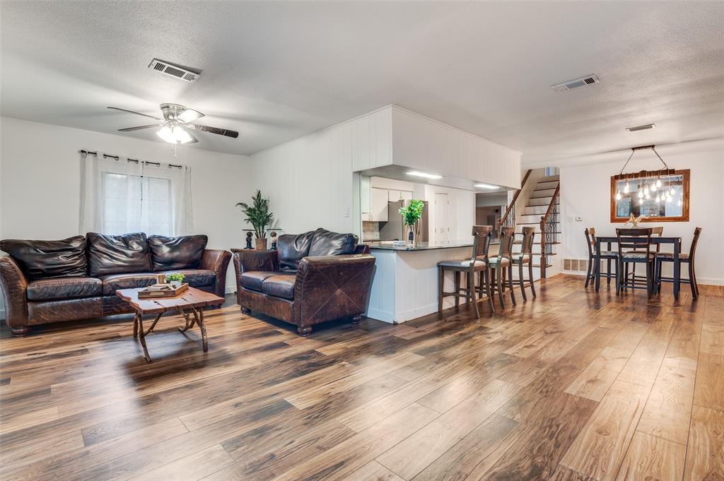 606 Quiram Lane Kemp, TX 75143 - Photo 6 of 23 a living room with furniture and wooden floor
