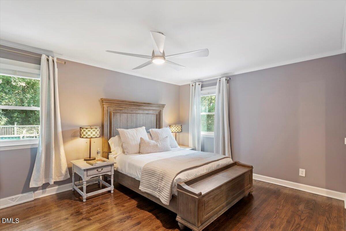2120 Hillock Drive Raleigh, NC 27612 - Photo 23 of 29 a bedroom with a bed and window