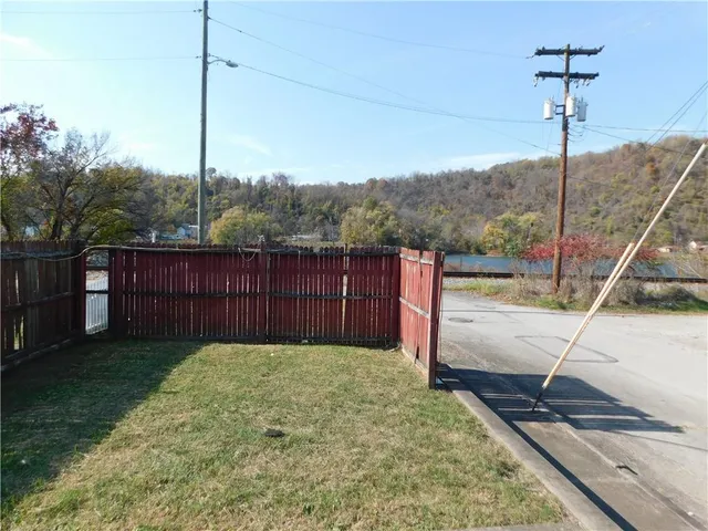 a view of a wooden fence