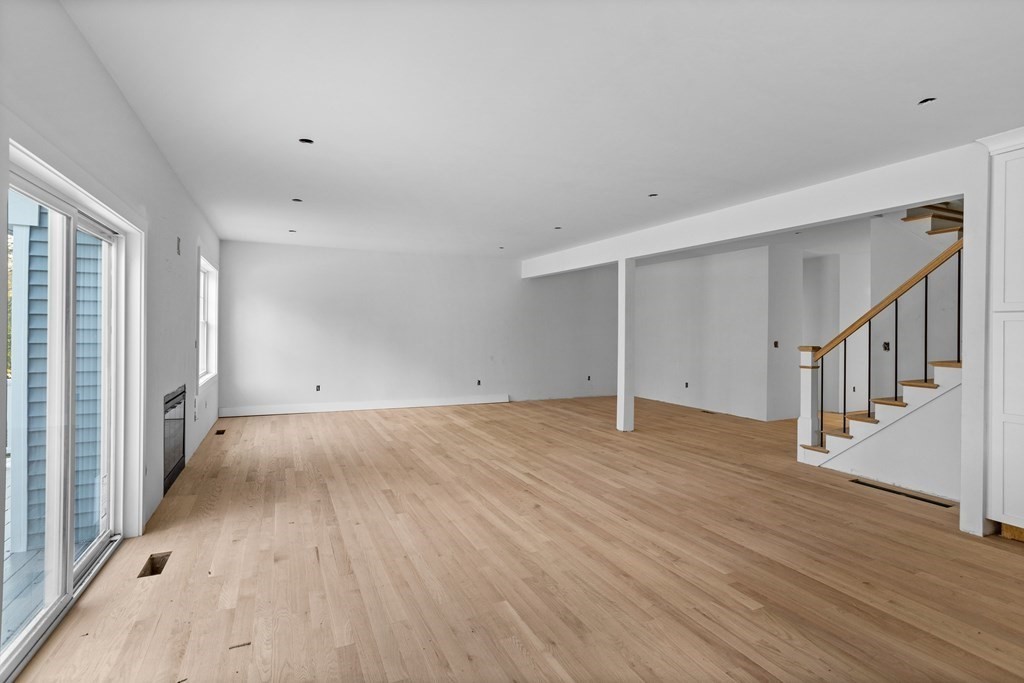 6 Nashoba Road Acton, MA 01720 - Photo 16 of 42 a view of a livingroom with wooden floor