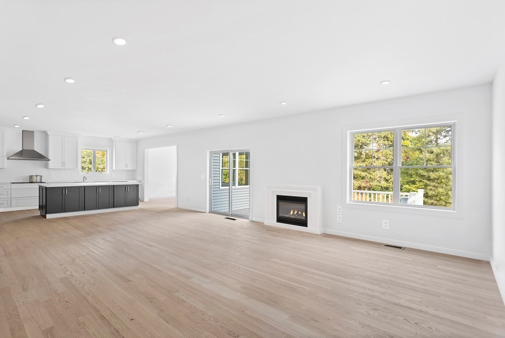 6 Nashoba Road Acton, MA 01720 - Photo 19 of 42 a view of empty room with wooden floor and fan