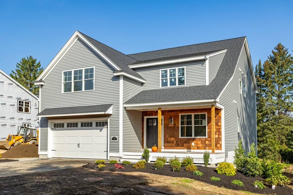 6 Nashoba Road Acton, MA 01720 - Photo 2 of 42 a front view of a house with a yard