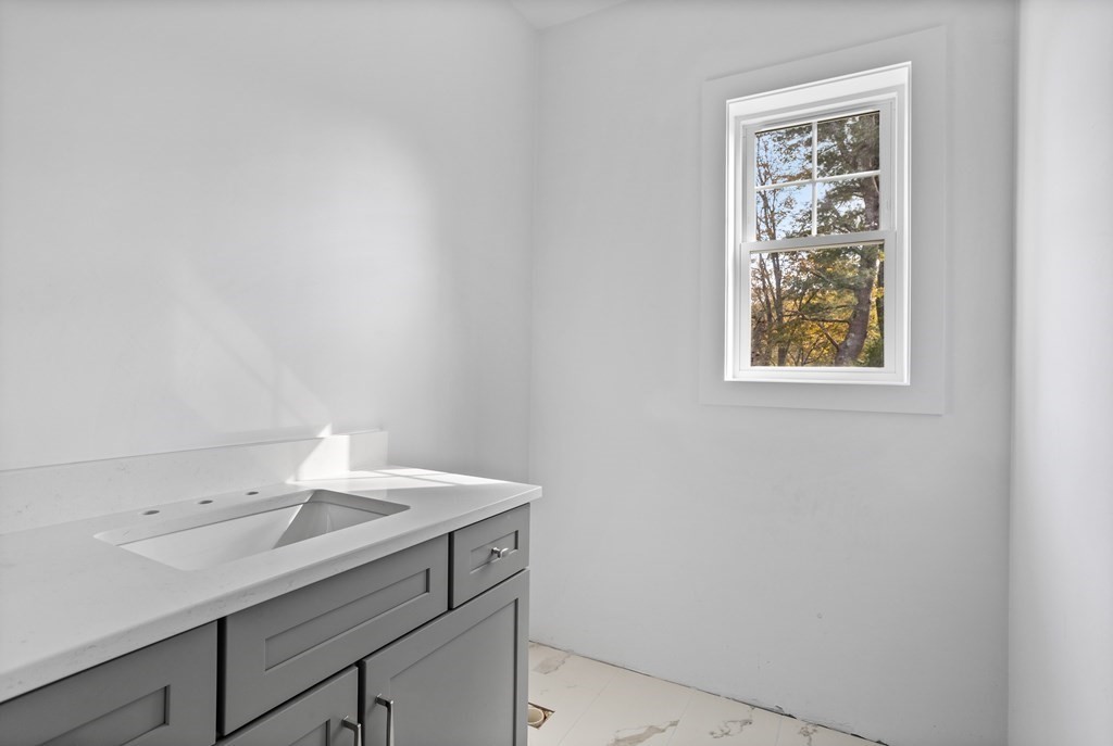 6 Nashoba Road Acton, MA 01720 - Photo 24 of 42 a view of utility room with a sink