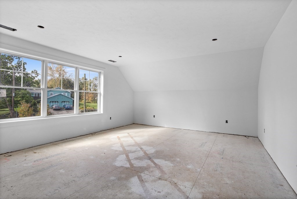 6 Nashoba Road Acton, MA 01720 - Photo 25 of 42 a view of an empty room with a window