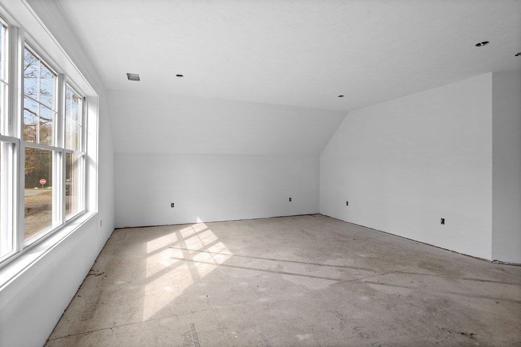 6 Nashoba Road Acton, MA 01720 - Photo 26 of 42 a view of a big room with windows