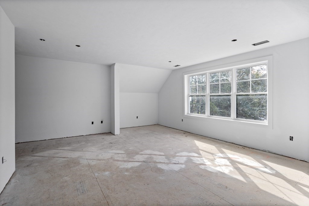6 Nashoba Road Acton, MA 01720 - Photo 28 of 42 a view of an empty room with a window
