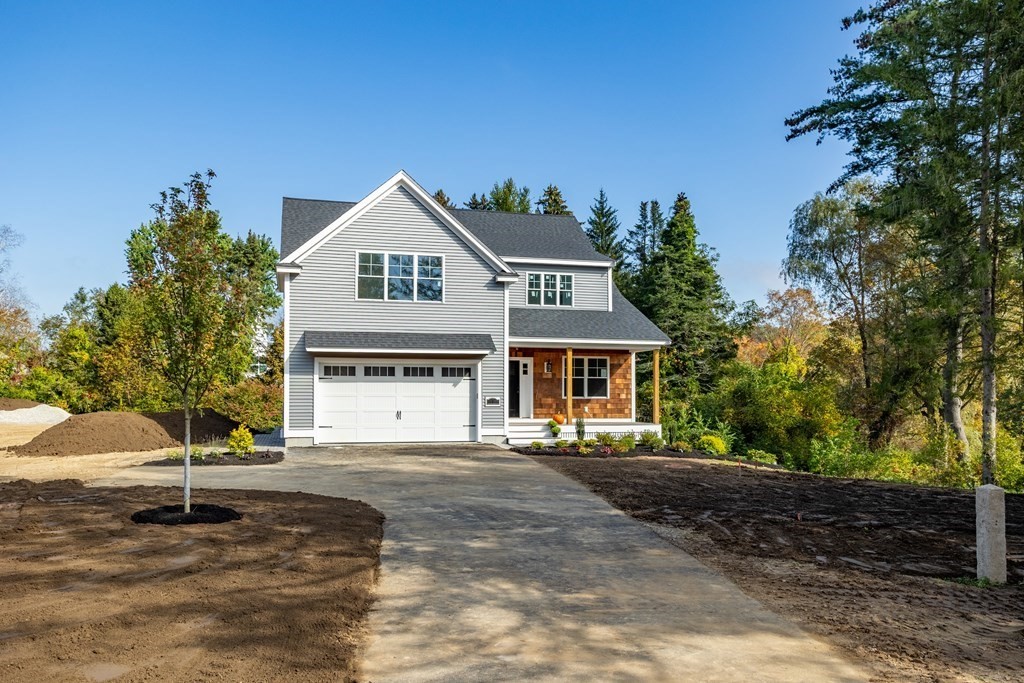6 Nashoba Road Acton, MA 01720 - Photo 3 of 42 a front view of a house with a yard