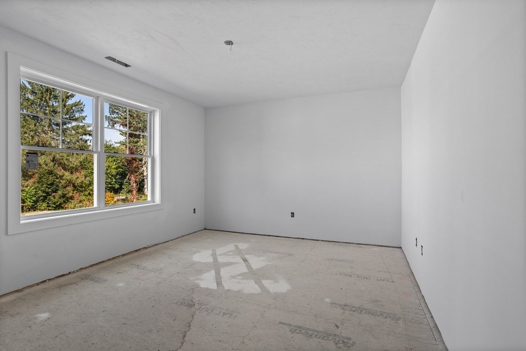 6 Nashoba Road Acton, MA 01720 - Photo 31 of 42 an empty room with windows