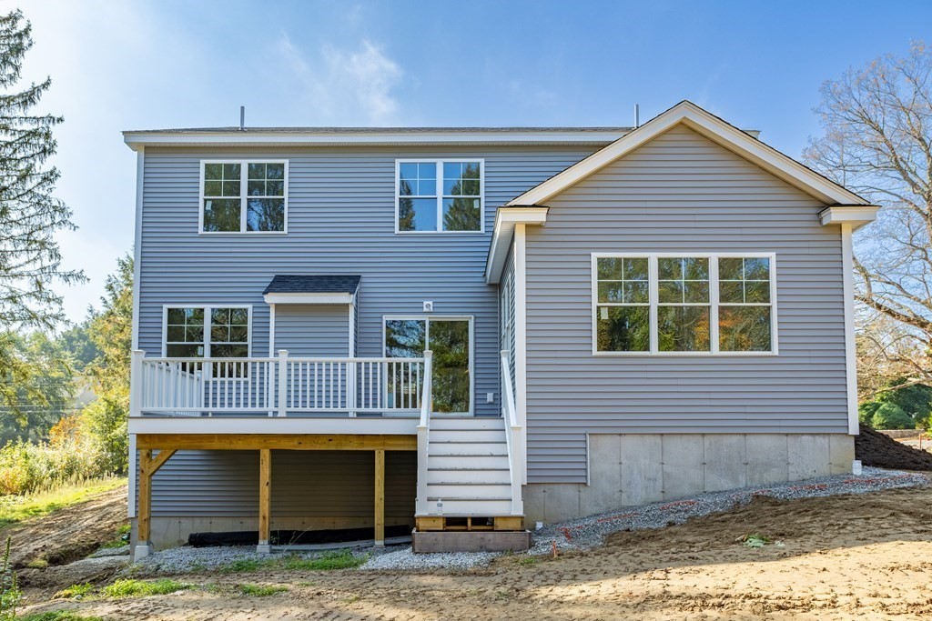 6 Nashoba Road Acton, MA 01720 - Photo 41 of 42 a view of front of a house with a yard