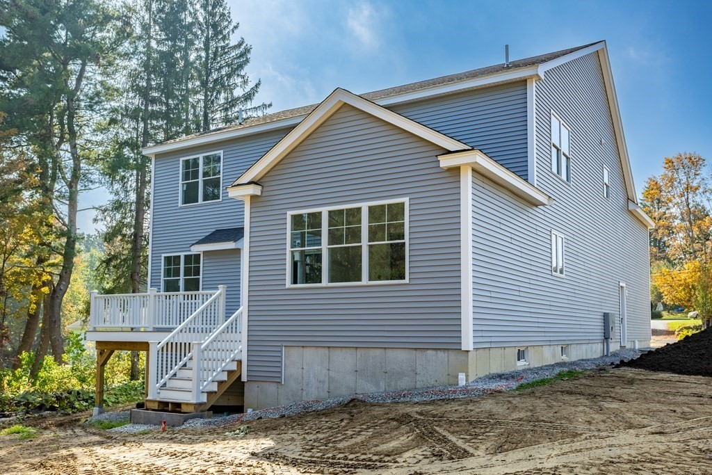 6 Nashoba Road Acton, MA 01720 - Photo 42 of 42 a view of a house with a yard