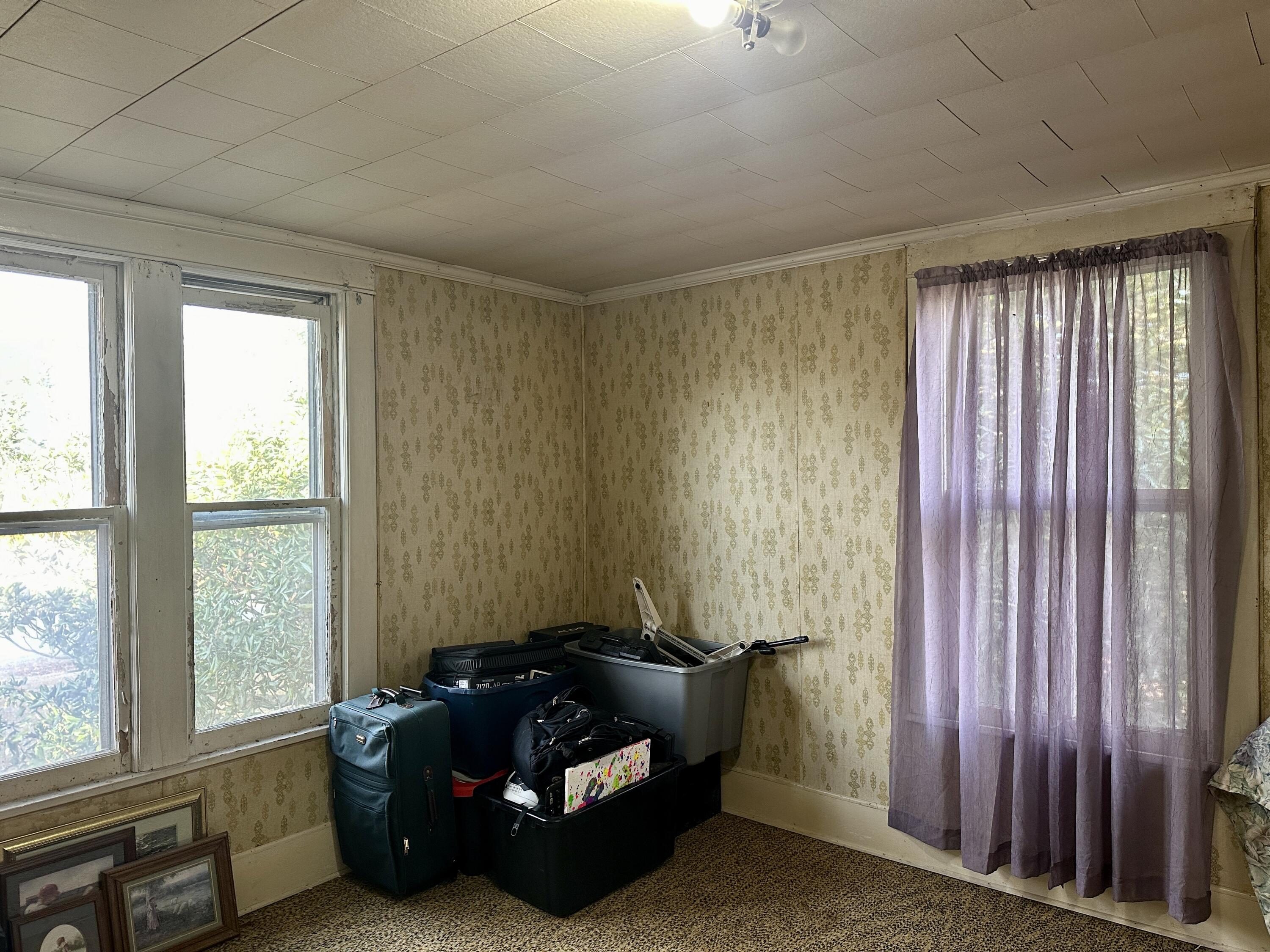 60 Soapstone Road Ridgeway, VA 24148 - Photo 17 of 26 a room with furniture and a window