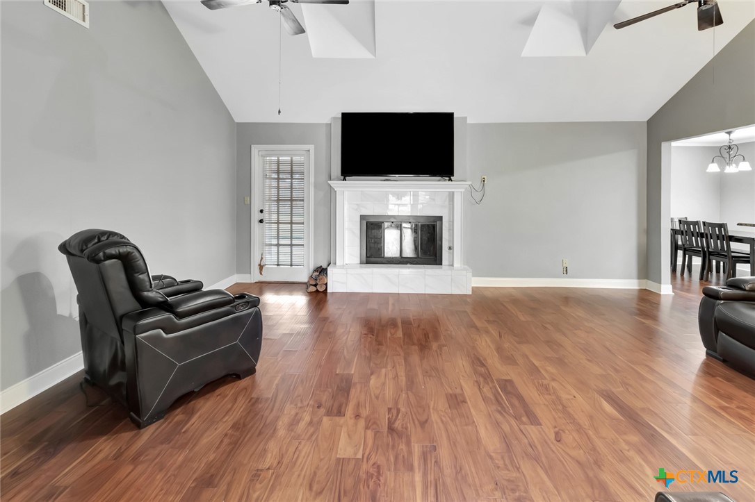 101 Kemble Street Victoria, TX 77904 - Photo 12 of 34 a living room with furniture and a flat screen tv