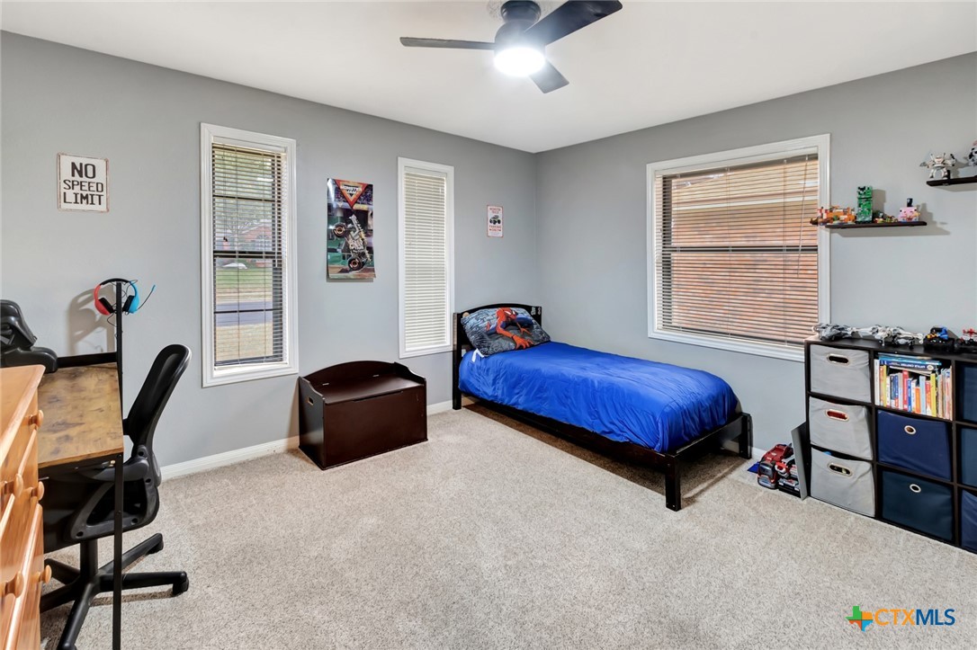 101 Kemble Street Victoria, TX 77904 - Photo 18 of 34 a bedroom with a bed and a window