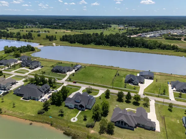 an aerial view of a house with a garden
